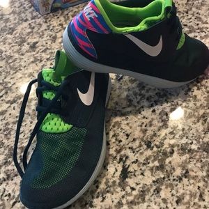 Blue and lime green Nike’s